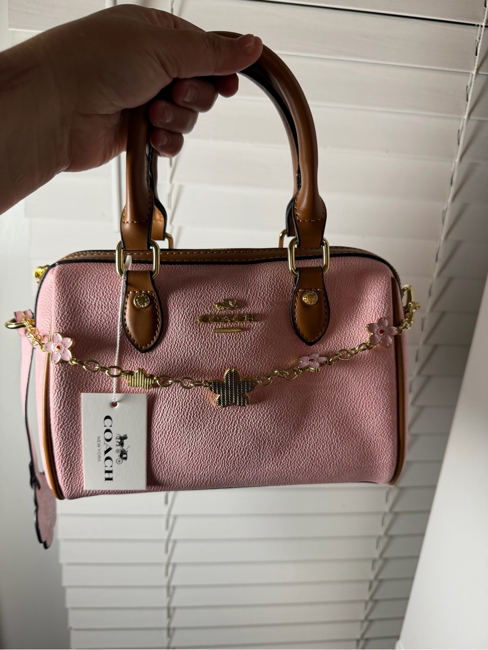 Coach Pink Pebble Leather Satchel with Brown Handles and Gold Hardware